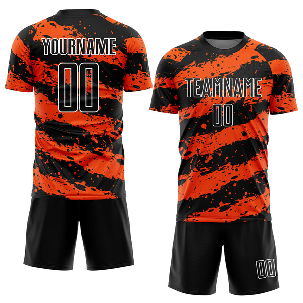 Custom Black Orange-White Splash Sublimation Soccer Uniform Jersey